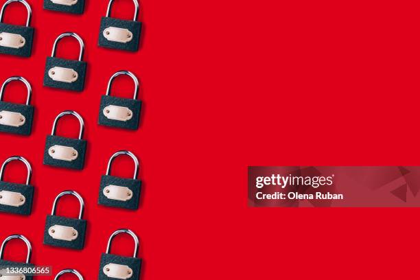 pattern with modern locks on a red background - keep going stock pictures, royalty-free photos & images