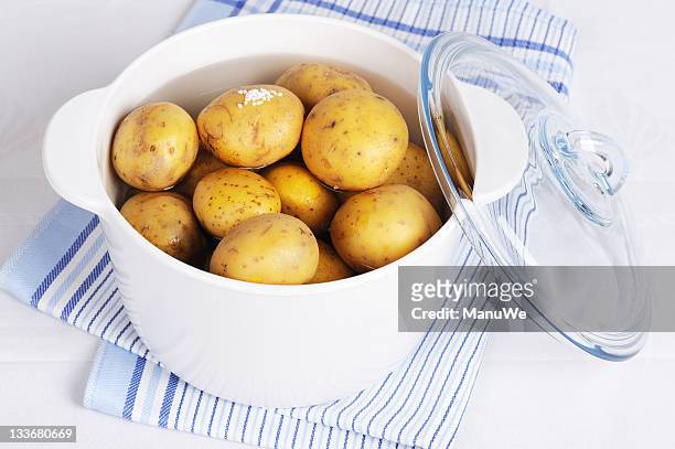 boiled potatos in a pot - potatoes stock pictures, royalty-free photos & images