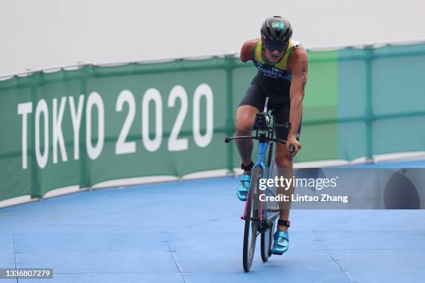 Jorge Luis Fonseca of Team Brazil competes in the bike leg during the Men's PTS4 triathlon on day 4 of the Tokyo 2020 Paralympic Games at Odaiba...