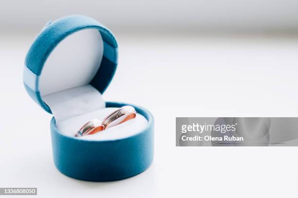 blue box with gold rings - wedding ceremony ring stock pictures, royalty-free photos & images