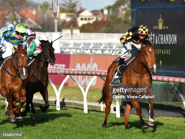 Brett Prebble riding Behemoth defeats Linda Meech riding Beau Rossa in Race 8, the Moet & Chandon Memsie Stakes, during Melbourne Racing at Caulfield...