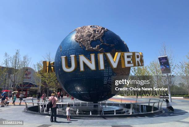 People visit the Universal Beijing Resort on August 26, 2021 in Beijing, China. The resort will make a trial operation from September 1 since the...
