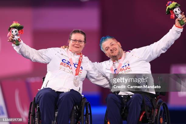 Sarka Musilova and David Drahoninsky of Team Czech Republic are awarded Silver medal's following the archery Mixed Team - W1 final match on day 4 of...