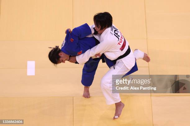 Junko Hirose of Team Japan against Zeynep Celik of Team Turkey in the Women's 57kg Bronze medal contest B on day 4 of the Tokyo 2020 Paralympic Games...
