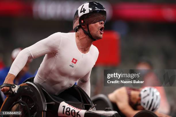 Marcel Hug of Team Switzerland celebrates after winning gold in the Men’s 5000m - T54 Final on day 4 of the Tokyo 2020 Paralympic Games at Olympic...