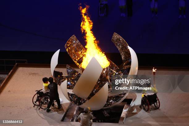 The cauldron is lit during the opening ceremony of the Tokyo 2020 Paralympic Games at the Olympic Stadium on August 24, 2021 in Tokyo, Japan.