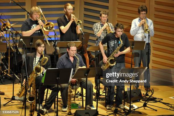 Paul Strachan, Ben Watte, Nick Walters, Sam Healey, Owen Bryce, Anthony Brown and Graham South of Beats & Pieces Big Band perform on stage at Kings...