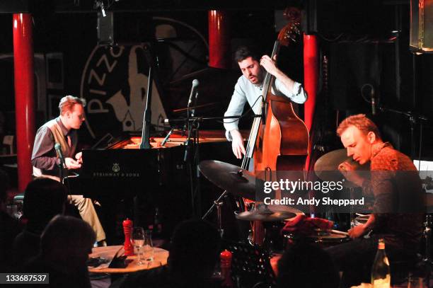 Jef Neve, Reuben Samama and Teun Verbruggen of Jef Neve Trio perform on stage at Pizza Express Jazz Club during Day 9 of the London Jazz Festival...