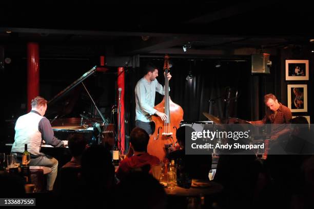 Jef Neve, Reuben Samama and Teun Verbruggen of Jef Neve Trio perform on stage at during Day 9 of the London Jazz Festival 2011 on November 19, 2011...