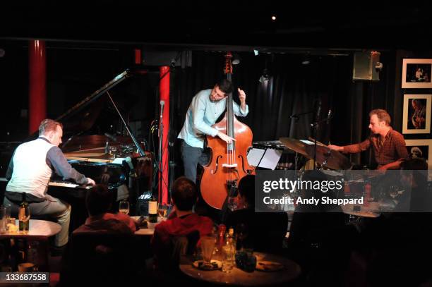 Jef Neve, Reuben Samama and Teun Verbruggen of Jef Neve Trio perform on stage at during Day 9 of the London Jazz Festival 2011 on November 19, 2011...