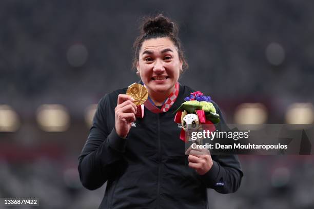 Lisa Adams of Team New Zealand celebrates with the gold medal during the medal ceremony for the Women’s Shot Put - F37 Final on day 4 of the Tokyo...