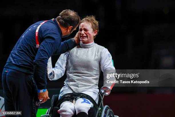 Beatrice Vio of Team Italy reacts to winning a gold medal against Zhou Jingling of Team Peoples Republic of China in the women's wheelchair fencing,...