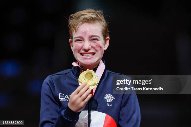 Beatrice Vio of Team Italy reacts to winning a gold medal against Zhou Jingling of Team Peoples Republic of China in the women's wheelchair fencing,...