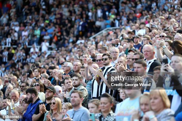 Newcastle United fans show their support prior to the Premier League match between Newcastle United and Southampton at St. James Park on August 28,...