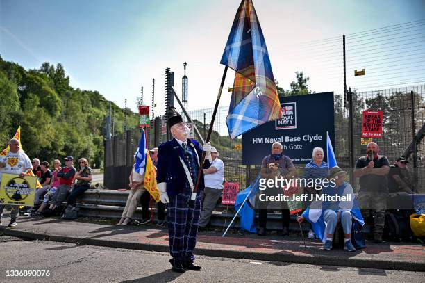 Protesters gather for an independence rally campaigning for nuclear disarmament at the North Gate of Her Majesty's Naval Base, Clyde on August 28,...