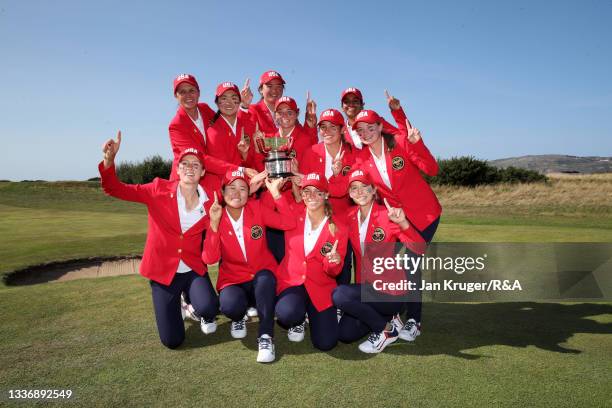 Team USA celebrate with the Curtis Cup trophy after their win over Team Great Britain and Ireland during day three of The Curtis Cup at Conwy Golf...