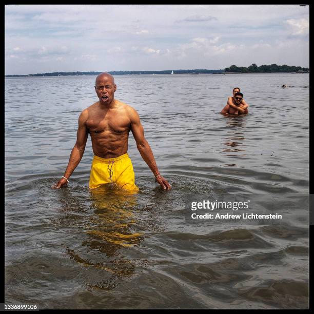 New York City mayoral candidate Eric Adams celebrates the new Federal holiday Juneteenth with a brief swim as he campaigns across the city on June...
