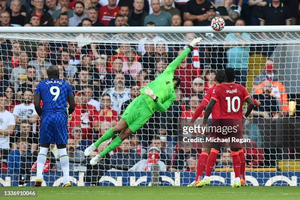 Alisson Becker of Liverpool fails to save a header from Kai Havertz of Chelsea resulting in Chelsea's first goal during the Premier League match...