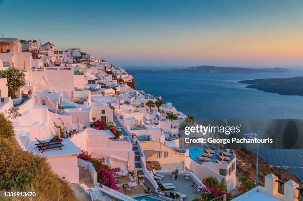 traditional architecture in santorini, greece at sunset - caldera stock pictures, royalty-free photos & images