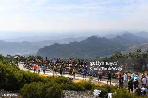 General view of the peloton climb the Pico Villuercas while fans cheer during the 76th Tour of Spain 2021, Stage 14 a 165,7km stage from Don Benito...