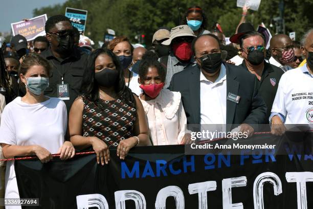 Andrea Waters King, Yolanda Renee King, and Martin Luther King III, attend the “March On for Washington and Voting Rights” on August 28, 2021 in...