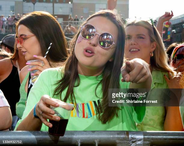 People pose for photos during Pride In Manchester 2021 on August 28, 2021 in Manchester, England.