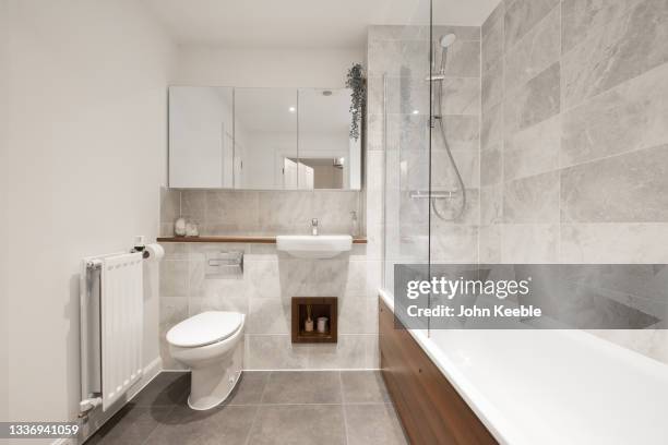 home property interiors - domestic bathroom stock pictures, royalty-free photos & images