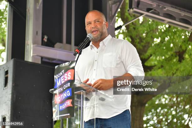 Former NAACP President Ben Jealous speaks at the March On For Voting Rights at The King Center on August 28, 2021 in Atlanta, Georgia.