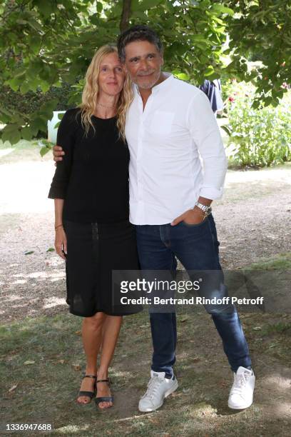 Sandrine Kiberlain and director Pascal Elbe attend the "On est fait pour s'entendre" movie Photocall during the 14th Angouleme French-Speaking Film...