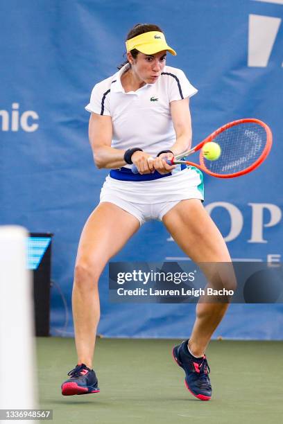 Christina McHale of USA returns a serve during the second set of her finals doubles match against Ena Shibahara of Japan and Shuko Aoyama of Japan on...