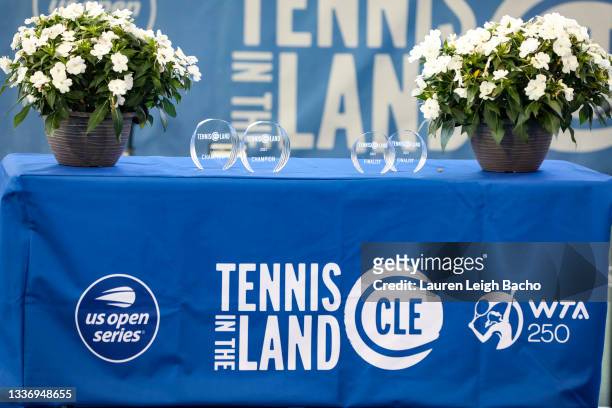 The champion and finalist doubles trophies sit on a table on day 7 of the Cleveland Championships at Jacobs Pavilion on August 28, 2021 in Cleveland,...