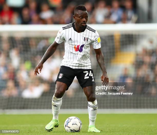 Jean Michael Seri of Fulham runs with the ball during the Sky Bet Championship match between Fulham and Stoke City at Craven Cottage on August 28,...
