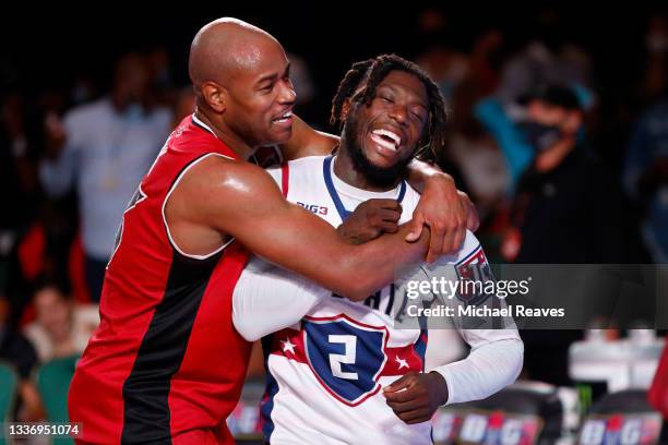 Jarrett Jack of the Trilogy and Nate Robinson of Tri-State embrace after the Trilogy beat the Tri-State 50-42 during the BIG3 - Playoffs at Atlantis...