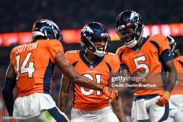 Courtland Sutton of the Denver Broncos celebrates with Teddy Bridgewater and Tim Patrick after a second quarter touchdown against the Los Angeles...