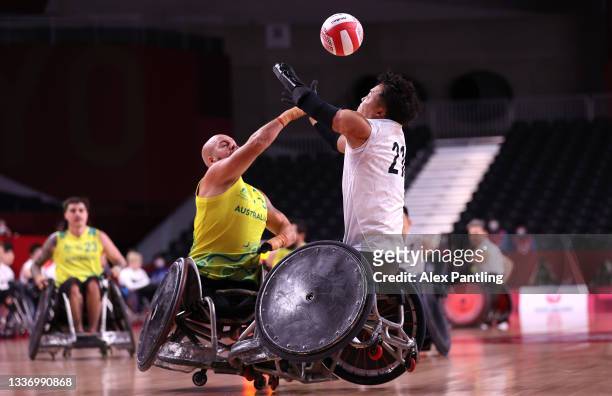 Ryley Batt of Team Australia competes for the ball with Yukinobu Ike of Team Japan in the first half during the bronze medal wheelchair rugby match...
