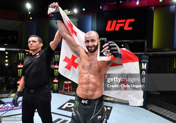 Giga Chikadze of Georgia reacts after his knockout victory over Edson Barboza of Brazil in a featherweight fight during the UFC Fight Night event at...