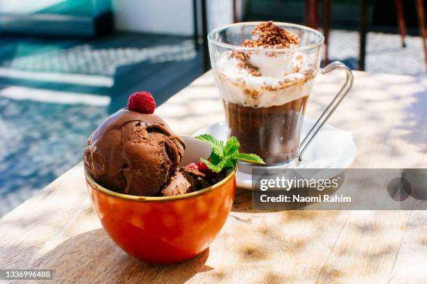 chocolate ice-cream and an affogato served at a rooftop bar - mint leaf restaurant stock pictures, royalty-free photos & images