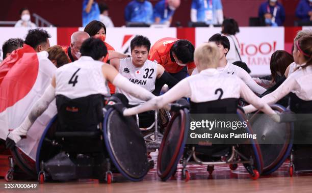 Katsuya Hashimoto of Team Japan reacts with teammates after defeating Team Australia during the bronze medal wheelchair rugby match on day 5 of the...