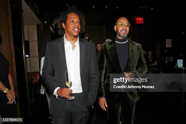 Jay-Z and Swizz Beatz attend Jay-Z's 40/40 Club 18th Anniversary celebration at 40/40 Club on August 28, 2021 in New York City.