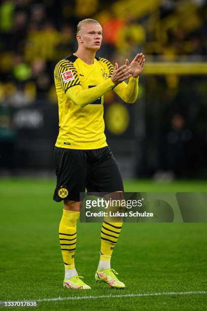 Erling Haaland of Dortmund applauds during the Bundesliga match between Borussia Dortmund and TSG Hoffenheim at Signal Iduna Park on August 27, 2021...