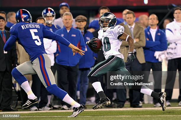 DeSean Jackson of the Philadelphia Eagles tries to outrun Steve Weatherford of the New York Giants on a punt return at MetLife Stadium on November...