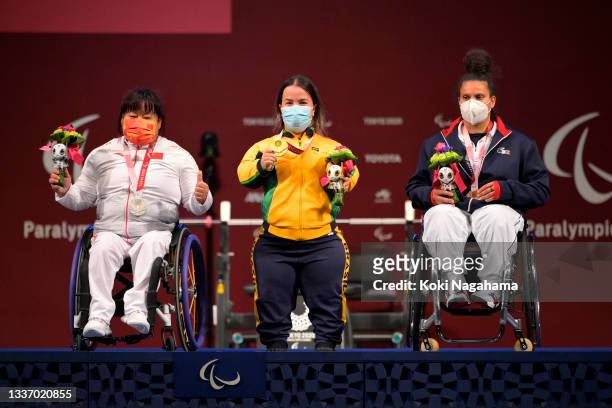 Silver medalist Lili Xu of Team China, gold medalist Mariana D'andrea of Team Brazil and bronze medalist Souhad Ghazouani of Team France pose for...