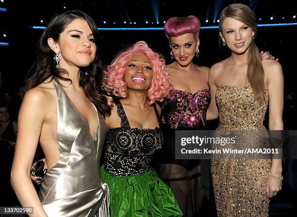 Singers Selena Gomez, Nicki Minaj, Katy Perry, and Taylor Swift pose in the audience during the 2011 American Music Awards held at Nokia Theatre L.A....