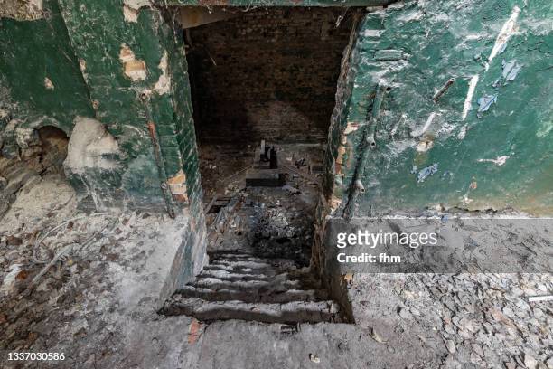 steps in an old cellar in an abandoned building - rust   germany stock pictures, royalty-free photos & images