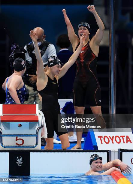 Morgan Stickney, Jessica Long and Natalie Sims of Team United States celebrate after Hannah Aspden of Team United States finishes in first place only...