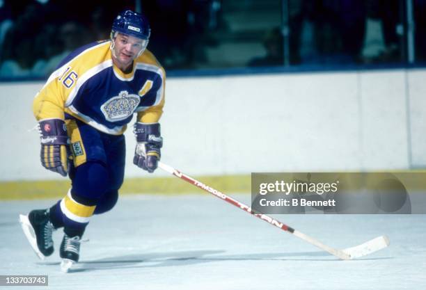 Marcel Dionne of the Los Angeles Kings skates on the ice during an NHL game against the New York Islanders on October 25, 1986 at the Nassau Coliseum...