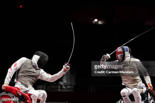 Hu Daoling of Team China and Oliver Lam-Watson of Great Britain compete during the Men's Team Foil Gold Medal Match on day 5 of the Tokyo 2020...