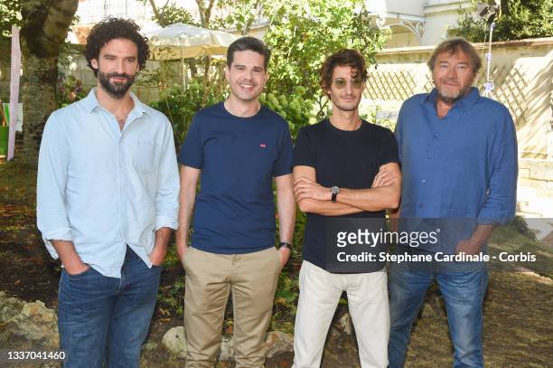 Actor Sébastien Pouderoux, director Yann Gozlan, actors Pierre Niney and Olivier Rabourdin attend "Boite noire" Photocall during the 14th Angouleme...