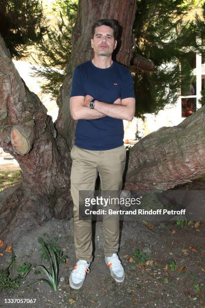 Director Yann Gozlan attends the "Boite noire" movie Photocall during the 14th Angouleme French-Speaking Film Festival - Day Six on August 29, 2021...