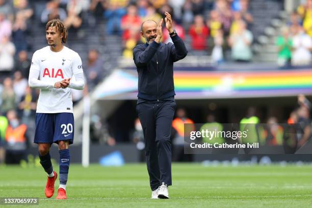 Dele Alli of Tottenham Hotspur and Nuno Espirito Santo, Manager of Tottenham Hotspur interacts with the crowd following the Premier League match...